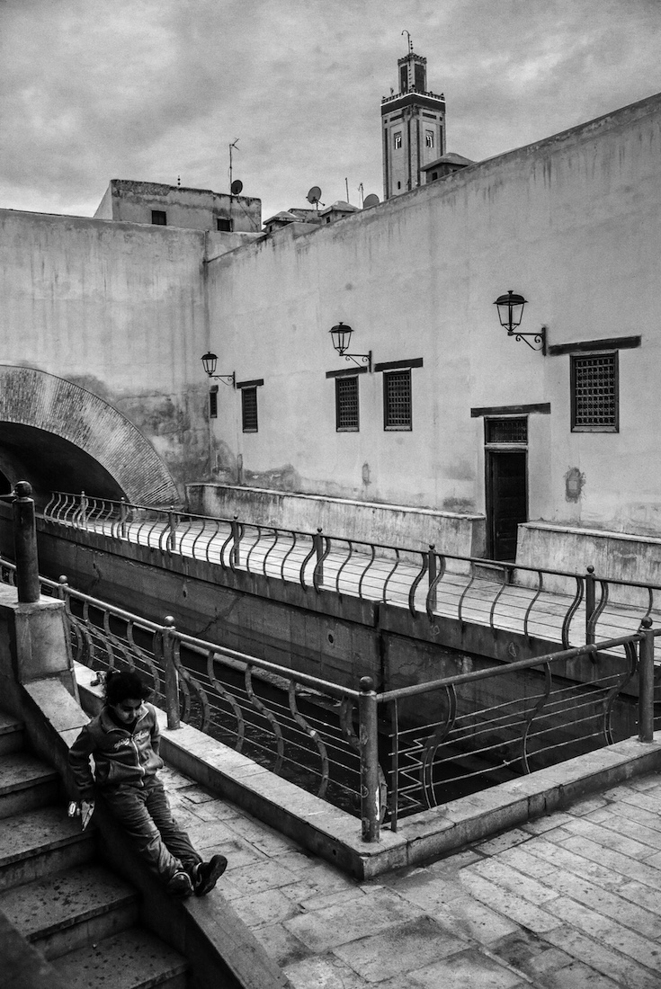 BETWEEN EAST AND WEST