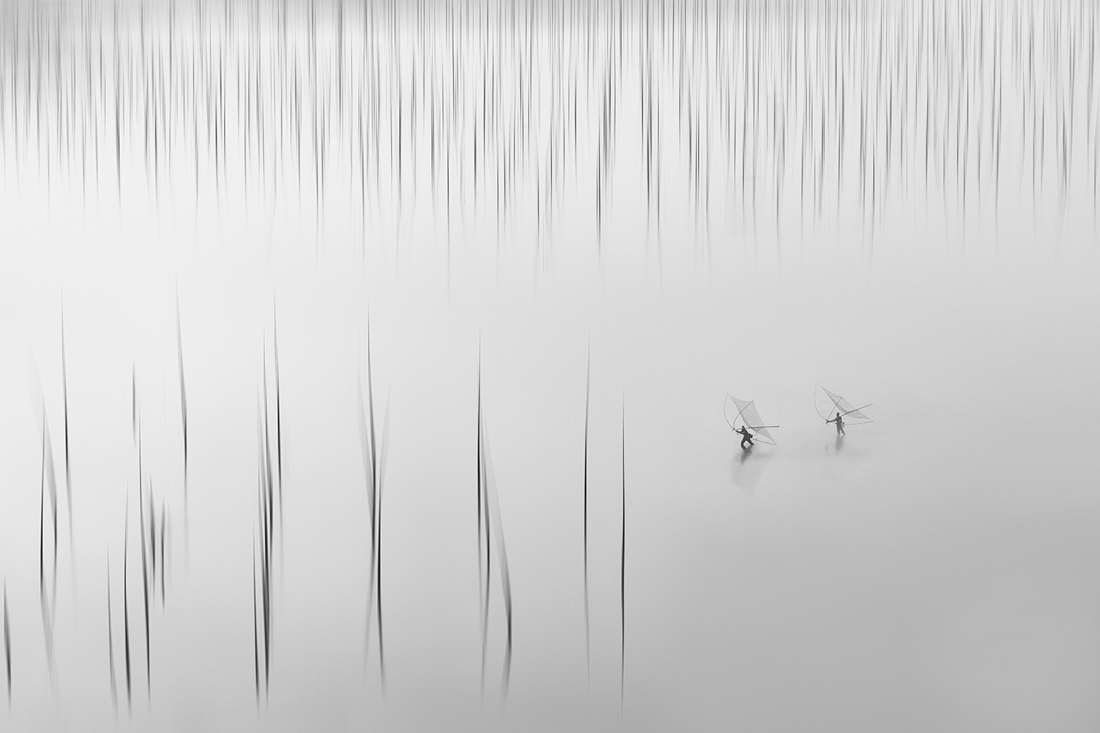 fishermen catching fish
