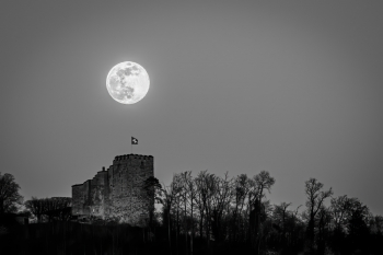 Full moon over castle