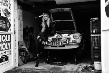 An old MG car and a young Model in love
